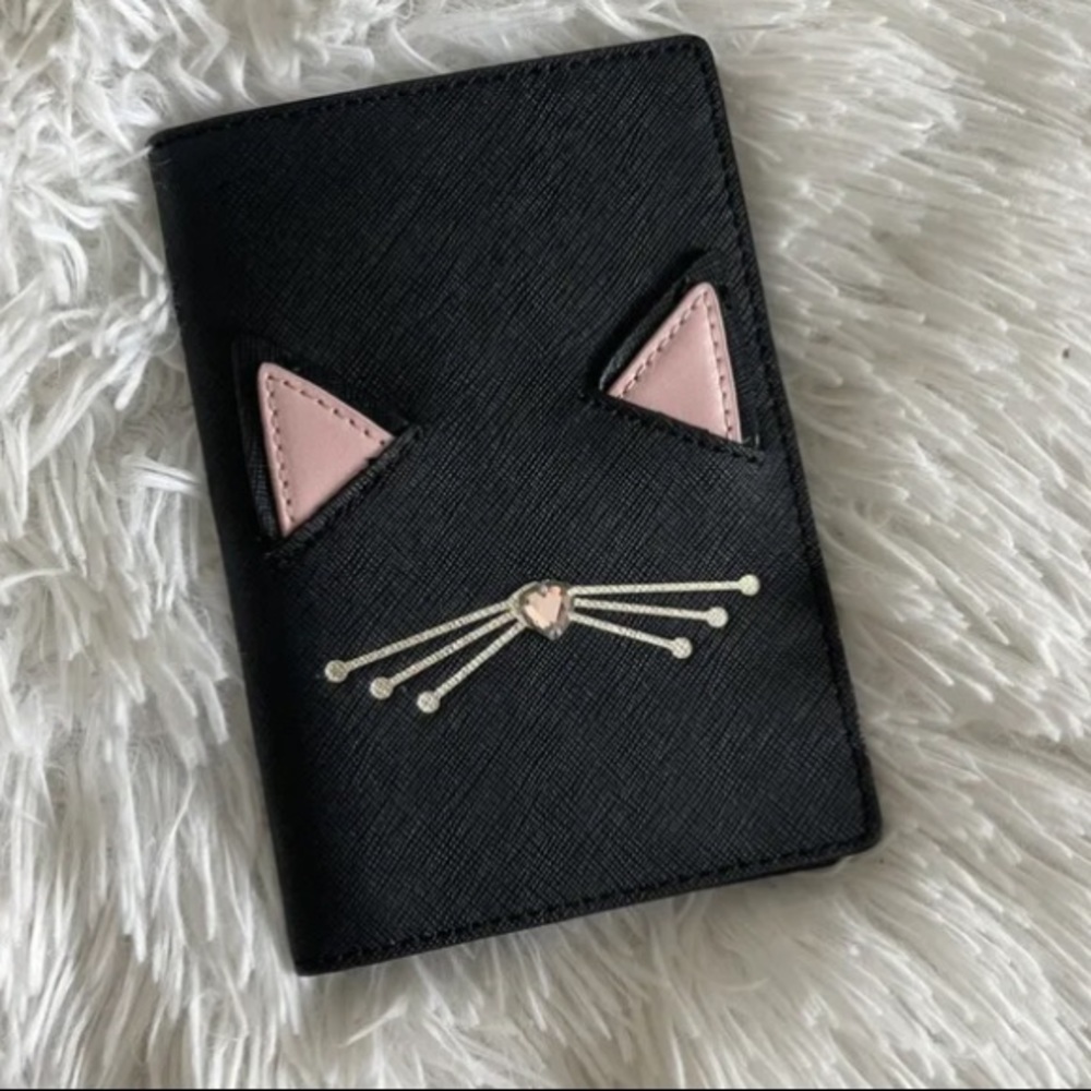 ISO Kate Spade passport and wallet.